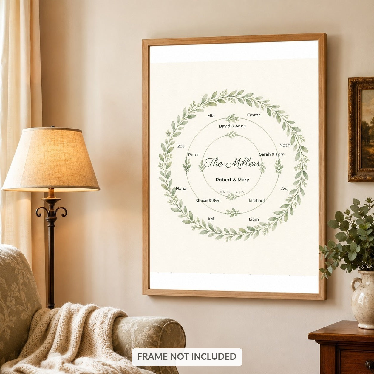 Watercolor leaf wreath family print in a light oak frame in a warm living room