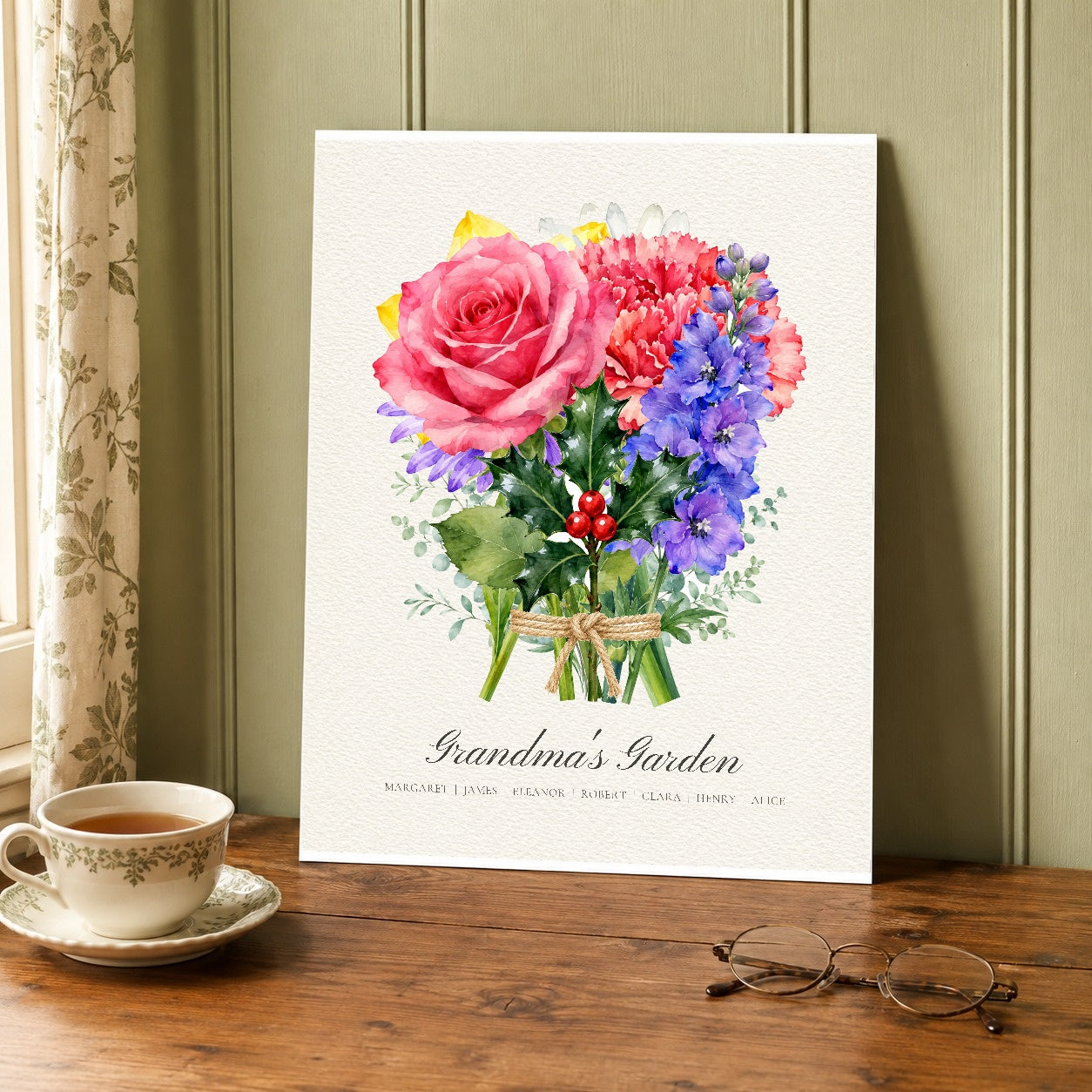 Birth flower name print resting on a wooden side table beside a teacup