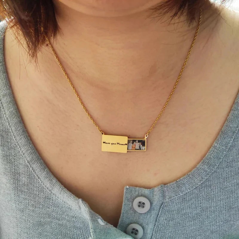 Photo locket necklace open showing family photo keepsake