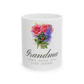 White ceramic mug printed with a watercolour bouquet, the name Grandma, and five grandchildren's names
