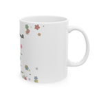 Little Blooms mug seen from the right, with the C-handle and glossy white ceramic