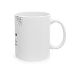 Wildflower mug seen from the right, with the C-handle and glossy white ceramic