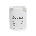 White ceramic mug printed with a wildflower spray, the name Grandma, and the grandchildren's names listed underneath