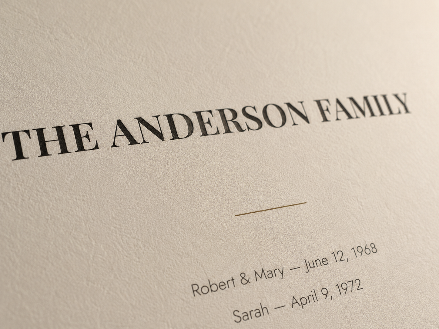 Close-up of the Monogram print showing the family surname and dates on matte archival paper